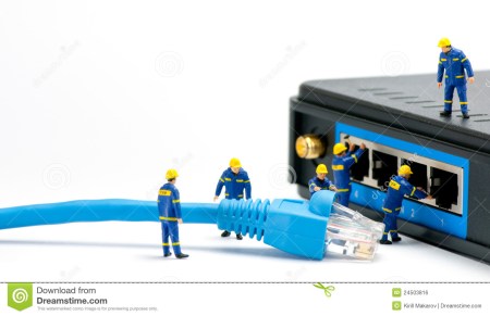 technicians-connecting-network-cable-24503816